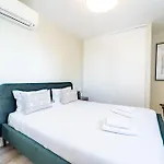 On The Square Flat - Center By House And People *